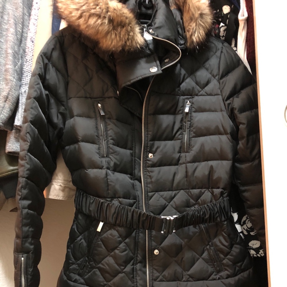 Black jacket with removable zipped hat